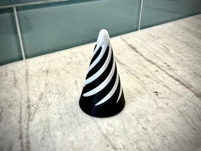 Ultra Durable Cone Fidget Passthrough Spiral Toy, a preview image from Printables