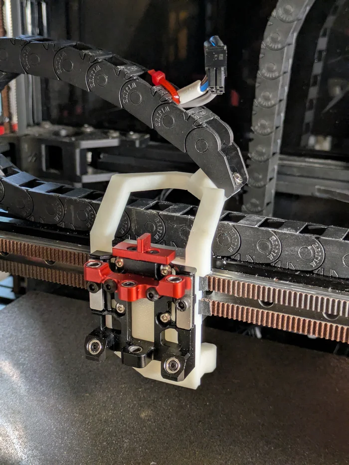 Cable chain mount + endstop arm for StealthChanger Shuttle, a preview image from Printables