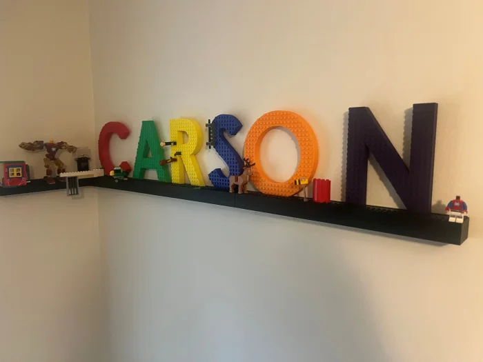 Modular Building Brick Letter & MiniFig Shelf, a preview image from Printables