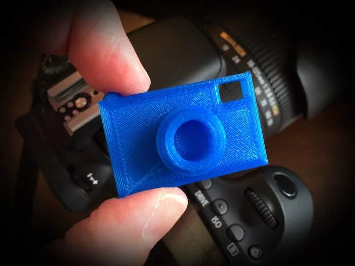 Camera Bag Name Tag or Keyring or Doll Camera, a preview image from Thingiverse
