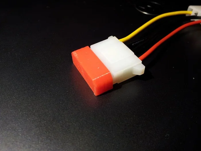 Molex hard drive power connector cap, a preview image from Thingiverse
