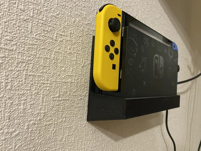 Nintendo Switch Wall Mount, a preview image from Thingiverse